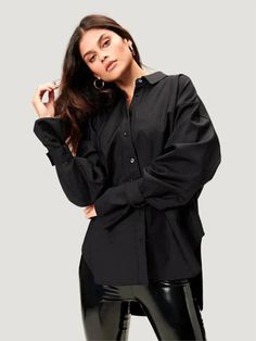 The Tabbed Poplin Shirt from Good American is a luxurious and classic button-closure shirt that will add a touch of sophistication to any outfit. Made from a deluxe cotton blend, the Tabbed Poplin Shirt is oversized and features stylish wide sleeves with a removable belted wrist cuff. This elegant shirt will look great with any outfit, and the oversized fit will make it comfortable to wear all day long. Additional Details: Product Type: Shirt Color: Black or White Fit: Oversized Wide Sleeves Rem Mia Mia Mine, American Denim, Leopard Print Blouse, Denim Shirt Dress, Elegant Shirt, American Shirts, Good American, Poplin Shirt, Wide Sleeves