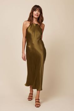 Turn every head in this sexy and sophisticated slip dress! The Fiona dress has adjustable straps for the right fit, while the bias cut creates an elegant cowl back and midi-length flare at the bottom. Camila Morrone, Sustainable Clothing, Lifestyle Brand, Lifestyle Brands, Wedding Guest Dress, Midi Length, One Shoulder Formal Dress, Chic Style, Wrap Dress