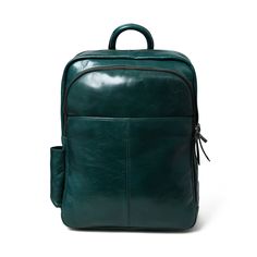 Make a bold statement with this head-turning Italian green leather backpack that radiates confidence and style. The glossy finish enhances its vibrant sea green color, creating a mesmerizing and eye-catching accessory. The sleek design and luxurious feel of the leather makes it a standout piece in any fashion ensemble, promising to elevate your look with a touch of glamour. Whether navigating city streets or making a grand entrance at an event, this bold and eye-catching green leather backpack i Rectangular Green Leather Backpack, Luxury Green Backpack For Daily Use, Green Leather Rectangular Backpack, Green Rectangular Leather Backpack For Daily Use, Rectangular Green Leather Backpack For Daily Use, Modern Green Backpack, Green Leather Laptop Backpack, Green Leather Backpack For Daily Use, Modern Green Leather Backpack For Travel