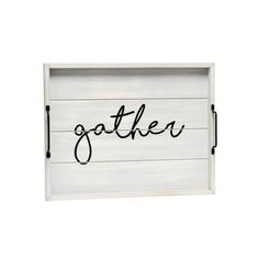 a white wooden sign with the word gather written in cursive writing on it