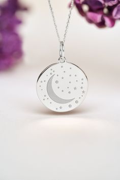 Moon and Stars Necklace can be personalized with a custom engraving on the back of the pendant. It's a very nice gift for Birthdays, Anniversaries and Weddings. Moon represents calmness, beauty and nurturing. ● STERLING SILVER ● FREE BACK SIDE PERSONALIZATION ● FREE SHIPPING ( 1-3 DAYS DELIVERY) ● Inner diameter of the jump ring is 4mm ● Pendant thickness is 0.5mm 🇺🇸 All items are HANDMADE IN USA 🇺🇸 All materials are sourced from USA ● Chain Length Options    - Without Chain    - 40 cm / 16 inches    - 45 cm / 18 inches    - 50 cm / 20 inches ● Pendant Size Options    - 14  mm  / 0.55 Inches diameter    - 15.3mm / 0.6 Inches diameter    - 16.5mm / 0.65 Inches diameter    - 19   mm / 0.75 Inches diameter ● The size of the pendant in the photos is 14mm / 0.55 inches ● PACKAGING  All item Moon Phase Star Charm Necklaces As Gift, Celestial Engraved Round Pendant Charm Necklaces, Personalized Silver Celestial Necklace, Silver Round Charm Necklace With Laser Engraving, Silver Laser Engraved Charm Necklace, Silver Round Laser Engraved Charm Necklace, White Gold Necklace With Star Charm, Round Silver Laser Engraved Charm Necklace, Moon And Stars Necklace