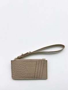 This slim and lightweight cardcase is an every day essential to throw in any bag or in your pocket. It features a 7” wristlet pull with metal pegs that open to accommodate your keys. The exterior has four dedicated card slots and the main zippered compartment holds additional cards and/or cash. Redefine your everyday carry with a touch of luxury and practical elegance. PLAY CARDCASE FEATURES Sustainable Up-cycled embossed leather 100% cotton twill lining 7" Wristlet pull with key slot 4 Exterior Bag Packaging, Poly Bags, Changing Pad, Pet Mat, Everyday Carry, Small Leather Goods, Black Backpack, Cotton Totes, Cotton Tote Bags