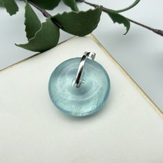 "Aquamarine Gemstone Pendant ,Donuts Aquamarine ,Silver 925 Pendant ,Gift, Cord necklace Pendant Size: 30 x 9mm Beads: 15mm Legend, Aquamarine is produced at the bottom of the sea, is the essence of the sea water, so sailors use it to pray for the sea god bless navigation safety, called it \"blessing god stone\". and is the birthstone for March. natural stone may have inclusions, natural lines or indentations.This is normal and part of the natural material." Modern Clear Round Jewelry, Aquamarine Rondelle Jewelry Gift, Aquamarine Rondelle Jewelry As A Gift, Aquamarine Rondelle Jewelry For Gift, Aquamarine Beaded Jewelry For Gifts, Sterling Silver Rondelle Jewelry As A Gift, Aquamarine Round Pendant Jewelry For Gift, Clear Round Gemstone Jewelry, Clear Round Beads Jewelry Gift