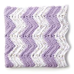 a purple and white crocheted dishcloth