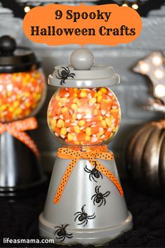 a halloween candy dispenser with the words spooky halloween crafts above it