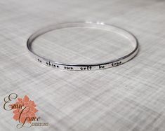 "This sterling silver engraved bangle bracelet in made by hand, formed, personalized and polished. It has a slightly rounded surface that will be laser engraved with the message of your choice (up to 65 characters, counting spaces and punctuation). This is a great layering piece (stacks well with many of my other lovely silver bangles!). Bracelet will arrive neatly packaged and ready to wear and enjoy, or give as a gift! {WHAT * YOU * WILL * GET} - - - - - - - - - - - - - - - - - - - - - - - - B Silver Engraved Bangle Name Bracelet, Inspirational Engraved Bangle Bracelets, Inspirational Engraved Bangle Bracelet, Silver Hand Stamped Bangle, Engraved Sterling Silver Bangle Name Bracelet, Silver Engraved Name Bracelet, Personalized Sterling Silver Bangle Bracelet, Engraved Sterling Silver Name Bangle, Personalized Engraved Bangle