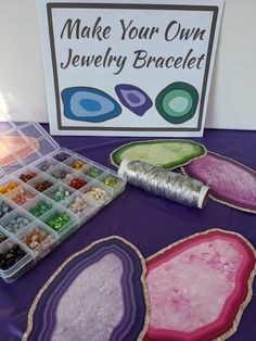 the table is set up with different items for making jewelry bracelets and other crafts