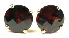 "Stone Type Mozambique Garnet Approximate Stone Size 10mm Approximate Stone Weight 8 cts Jewelry Metal Solid 14k Yellow Gold Our Warranty A full year on workmanship Our Guarantee Totally unconditional 30 day guarantee We've got the most heart stopping, beautiful Mozambique Garnets in the world (in our humble opinion)! Garnets from this area of the world have exceptional clarity and color. I really, really, really hate muddy prune-juice-colored garbage that's passed off as nice garnets. Yuck! I j Yellow Gold Earrings With Round Stones For Formal Occasions, Formal Yellow Gold Earrings With Round Stone, Red Round Diamond Cut Earrings, Faceted Round Earrings For Formal Occasions, Formal Round Faceted Earrings, Faceted Earrings For Formal Occasions, Formal Faceted Round Earrings, Classic Faceted Yellow Gold Earrings, Classic Faceted 14k Gold Earrings