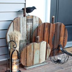 a couple of pumpkins sitting on top of a porch