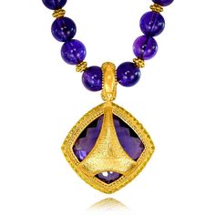 The Royal Collection is inspired by an intricate mosaic of royal palaces around the world. From exotic Marrakesh and colorful Barcelona, to the magical islands of Greece, it reminds us that we’re all descendants of kings. Handmade in NYC. Limited Edition. Price includes 18-inch (457.2 mm) strand of round amethyst beads. Enhancer dimensions: 41 mm L by 29 mm W. For additional wearability and pricing options, please contact us. Metal: 18 karat yellow gold. Center Amethyst: 1 stone, total carat wei Luxury Amethyst Necklace For Formal Occasions, Luxury Amethyst Pendant Jewelry, Elegant Yellow Gold Amethyst Necklace, Luxury Purple Pendant Necklace, Luxury Yellow Gold Pendant Gemstones, Luxury Amethyst Pendant Necklace, Luxury Yellow Gold Amethyst Necklace, Exquisite Gold Gemstones With Accents, Elegant Purple Jewelry With Large Pendant