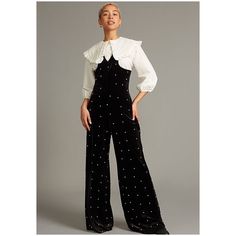 Command The Room In This Chic Velvet Jumpsuit Adorned With White Pearls. Fitted Bodice And Wide Leg. Achieve Different Looks By Wearing It Alone Or Layered With A Shirt. V Front And Back Sleeveless Side Slant Pockets Wide Leg 100% Polyester Back-Zip Fastening Dry Clean Imported Dimensions 59" L Chic Fitted Jumpsuits And Rompers With Bib Front, Striped Palazzo Pants, Button Pants, Multi Colored Flowers, Velvet Jumpsuit, Sequin Pants, Halter Jumpsuit, Fashion Aesthetics, Wide Leg Linen Pants