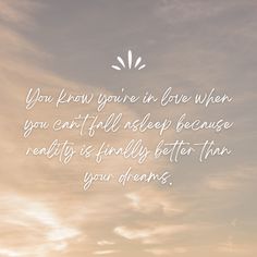 the sky is filled with clouds and there is a quote on it that says you know you're in love when you can't fall asleep because reality