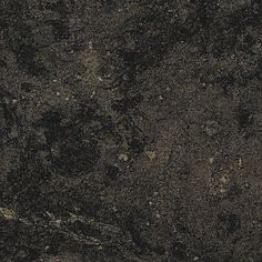 a close up view of a black granite surface