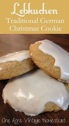 two glazed cookies with icing on top are stacked next to each other in front of the words, lekwuchen traditional german christmas cookie