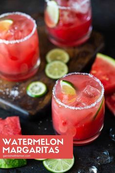 two glasses filled with watermelon margaritas and lime slices