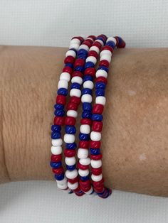 Set of 4 beaded stretch bracelets  Random pattern Multicolor Round Beads Bracelet For 4th Of July, Patriotic Adjustable Colorful Beads Jewelry, Adjustable Patriotic Jewelry With Colorful Beads, Adjustable Colorful Beaded Jewelry For 4th Of July, Patriotic White Stretch Bracelet With Round Beads, Beaded Bracelet For 4th Of July, Patriotic White Stretch Bracelet, Patriotic Round Beads Stretch Bracelet For 4th Of July, 4th Of July Gift Round Beads Stretch Bracelet