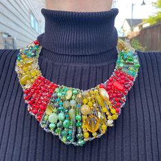 SKU :BCK99D Handmade Pride Choker 20"" Multicolors Beads Statement Bib Necklace UPC Code 787976776275 Product feature Adjustable Extender included to adjust length Gemstone Color Red, Yellow, Green Length (inch) 20 inch Finding Lobster Claw BENEFITS: This stunning piece is a timeless work of art, embodying elegance & wonder. The intricate work will inspire awe and draw a crowd; you will feel amazing with this collar choker necklace on. Make a statement with this fabulous, one-of-a-kind unique pi Pride Choker, Feeling Of Love, Handmade Bib, Claw Necklace, Forever Gifts, Collar Choker, Statement Bib Necklace, Statement Choker, Crystal Choker