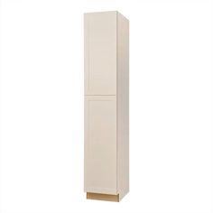 a tall white cabinet with two doors