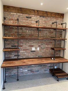 a brick wall with shelves on each side