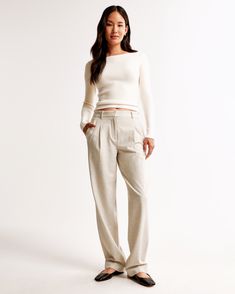 Elevate your wardrobe with the A&F Quinn Tailored Pant in a chic oatmeal shade. These high-rise pants are crafted from a premium menswear fabric, offering a sophisticated straight-leg silhouette that is slightly slimmer than our Sloane pant.

- Size: 30 LONG
- Color: Oatmeal
- Material: Pocket Bag - Polyester, Elastane
- Gender: Female
- Features: Fixed waistband, pleat detail, functional pockets, and zipper

Perfect for both office and casual settings, the Quinn Tailored Pant combines functiona Cream Straight Hem Bottoms For Work, Classic Cream Pants With Straight Hem, Cream Fitted Pants With Straight Hem, Fitted Cream Pants With Straight Hem, Beige Straight Bottoms For Workwear, Cream Straight Leg Pants For Business Casual, Beige Straight Pants For Workwear, Cream Straight Leg Bottoms For Business Casual, Business Casual Cream Straight Leg Bottoms