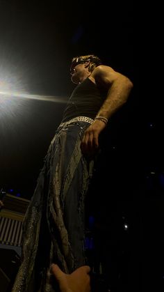 a man standing on top of a stage