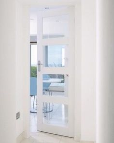 an open white door leading into a room