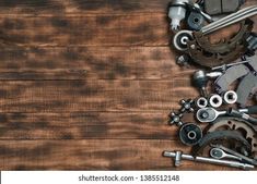 an assortment of different types of tools on a wooden table top view with copy space