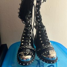 Black & Silver Brand New Long Combat Boots, Never Worn! Janet Jackson Vibes! Black Heels With Rivets And Round Toe, Lace-up Party Boots With Rivets, Party Lace-up Boots With Rivets, Riveted Round Toe Boots For Night Out, Round Toe Boots With Rivets For Night Out, Black Boots With Silver Studs And Round Toe, Black Boots With Spikes For Spring, Black Heels With Silver Studs And Round Toe, Edgy Flat Heeled Boots For Parties