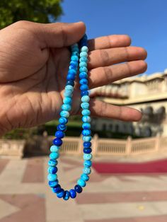 Natural Shade Blue  Round Shape Smooth Opal Beads Necklace ,7-10 mm Opal Beads, 16 Inch Strands Necklace AAA+ Quality. Gemstone  :    Opal. Color           :    Shade Blue. Size             :     7-10 mm size. Shape         :    Round Smooth Shape. Style           :    Smooth Handmade Beads.  Quality       :    AAA+ Length       :    16''  Strand.  For   :   Necklace, Jewelry Design, Craft Making, Gift, Etc.   These Are Natural Gemstones Therefore, Variation In The Shade & Quality Is Expected. Gemstone Picture Shown Are Of Actual Gemstone That You Will Receive, However, The Color & Appearance May Look Slightly Different Depending On Your Monitor Resolution & Climatic Condition. Some Imperfections Can Be Expected As Stones Are Natural. If Required, Please Ask Us To Show The Lot Image Before Blue Beaded Bracelets For Meditation With Colorful Beads, Traditional Blue Beaded Gems And Cabochons, Hand-strung Blue Beaded Bracelets With Round Beads, Hand-strung Blue Beads For Beach, Hand-strung Blue Beaded Bracelets, Bohemian Hand-strung Blue Beads, Blue Rondelle Gemstone Beaded Bracelets, Blue Gemstone Beads Rondelle Beaded Bracelets, Blue Polished Bead Necklaces For Beach