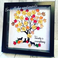 a family tree made out of paper with leaves on it and the words, snufflee sentiments