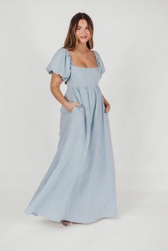 Join us in welcoming the *breathtaking* Candace Maxi Dress to the Worth Collective repertoire - we know you're going to love her! This pastel-hued, 100% linen dress is the epitome of elegance and luxury. Its beautiful neckline frames your decolletage, while the gently puffed sleeves and full skirt accent this gown's exquisite craftmanship. It's the perfect choice for this season's weddings, photo shoots, and other special events! FIT: Runs true to size. Empire waist and smocked bodice will accom Worth Collective, Curve Model, Athleisure Tops, Knit Outerwear, Post Partum, Short Sleeve Maxi Dresses, Flowing Skirt, Puffed Sleeves, Linen Dress