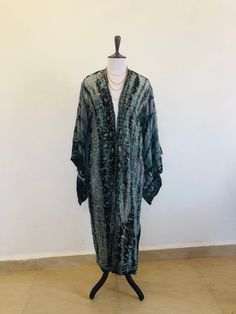 "A Beautiful Kimono Jacket,Robe . Long embroidered,silk,tie dyed and floaty ; A Perfect Cover Up for Holidays ,Festivals and Parties. This has been Handmade and Hand Dyed from a Vintage Indian Sari.... so is completely Unique and Sustainable. A Wonderfully Chic and Flattering Grey,Lavender and Black Design in Silk ,Embellished all over with swirls of Sparkling Silver Lurex Embroidery . The style is loose and edge to edge , with Gorgeous Square Kimono Sleeves. One Size S M L UK size 10 to 16 US 6 Tie-dye Kimono With Kimono Sleeves For Festivals, Festival Tie-dye Kimono With Kimono Sleeves, Tie Dye Kimono For Festivals, Festival Tie-dye Kimono, Long Spring Kaftan With Batik Print, Long Batik Print Kaftan For Spring, Handmade Long Bohemian Outerwear, Long Kaftan With Batik Print For Spring, Handmade Long Outerwear For Festival