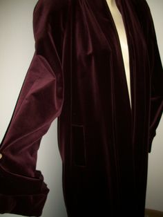 This is a fabulous 40a style, deep burgundy velvet swing coat jacket Made in Canada Vintage 1980s tagged a medium,  lots of room, oversized jacket, light shoulder pads, open front, no hooks or buttons, 2 front pockets fully lined in a rich red soft satin Length-49-50 inches, shoulder to bottom bottom sweep 58 inches  great condition Pale Pink Dress, Vintage Floral Design, Deep Burgundy, Silk Camisole, Oversized Jacket, Vintage Coat, Night Gown, Pink Dress, Coats Jackets