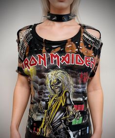 THE STITCHES Distressed Rock collection - This Iron Maiden is a handmade bleached crop top/t-shirt made with a brand new officially licensed band shirt. - Distressed Iron Maiden crop top/shirt - Safety pin unisex hand-made crop/tee - Material: Bleached cotton Measurements - Fit UK 8-12, US4-8 - Width (armpit to armpit) : 18 Inches  - Length (top of collar to bottom): 25 inches Care instructions: - This is a distressed item and will require proper care, it should be washed inside out gently and hung to dry for the longest life possible of the garment. - Hand wash recommended or delicate wash cycle with washing bag/iron on reverse / do not tumble dry. Thank you for your support. PURE ROCK 'N' ROLL!! Safety Pins, Rock Collection, Crop Top Shirts, Top T Shirt, Iron Maiden, Band Shirts, Safety Pin, Crop Tee, Rock And Roll