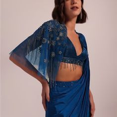 This Designer Piece Was Custom Made Wore It Once In A Reception Party For 2 Hrs It Is Padded Blouse . It Is Size Medium Which Is 34-36. Super Comfortable And Elegant Piece . Traditional Blue Pre-draped Saree For Party, Blue Traditional Pre-draped Saree For Party, Blue Pre-draped Saree For Festive Evenings, Blue Pre-draped Saree With Resham Embroidery For Party, Blue Bollywood Pre-draped Saree For Evening, Traditional Blue Blouse Piece For Evening, Blue Pre-draped Saree With Zari Work For Evening, Blue Traditional Drape Blouse For Evening, Traditional Drape Blue Blouse Piece For Evening