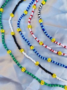 One handmade smiley beaded necklace. The necklace is made with a stretch cord and has a lobster clasp fastening.  It is super cute, lightweight and comfortable to wear and the perfect statement accessory for you to wear and make you smile. These look great on their own or layered! This is available as the standard 17" length necklace but please get in touch if you require a custom size and I can sort this for you. There is also the option of having an extender chain which means it can be made up Fun Adjustable Necklace For Everyday Wear, Fun Adjustable Necklace For Everyday, Fun Adjustable Everyday Necklace, Adjustable Fun Everyday Necklace, Adjustable Playful Beaded Necklaces With Tiny Beads, Playful Adjustable Beaded Necklace With Letter Beads, Playful Adjustable Letter Beads Beaded Necklace, Smiley Faces, Makeup Makeover