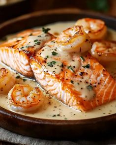 grilled salmon and shrimp served in a creamy sauce