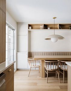 the kitchen is clean and ready to be used as a dining room or office space