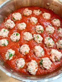 the meatballs are covered in marinara sauce