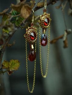 Red and gold braided earrings - seed bead beadwork jewelry - swarovski earrings - gold filled chain- delica seed beads Elegant Red Earrings With Gold Beads, Gold Beaded Earrings With Bead Caps As Gift, Gold Beaded Earrings With Bead Caps For Gift, Elegant Red Teardrop Beaded Earrings, Red Dangle Jewelry With Bead Caps, Elegant Festive Earrings With Beaded Chain, Elegant Beaded Chain Earrings As Gift, Elegant Beaded Chain Earrings For Gift, Gift Red Beaded Earrings With Bead Caps