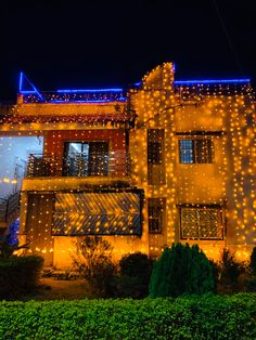 a building with lights all over it at night