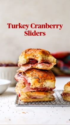 three turkey cranberry sliders stacked on top of each other