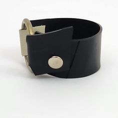 Modern Cuff Bracelet With Black Band, Modern Leather Bracelet With Black Band, Modern Everyday Cuff Bracelets, Modern Cuff Wristband As Gift, Modern Cuff Bracelets For Everyday Wear, Modern Cuff Bracelet For Everyday Wear, Modern Adjustable Bracelet Wristband, Modern Handmade Leather Cuff Bracelet, Handmade Modern Leather Cuff Bracelet