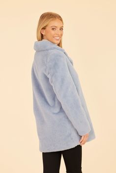 Indulge in luxurious comfort and timeless style this fall with the Mid-Length Faux Fur Coat. This chic piece is crafted from a sumptuously soft faux fur fabric that feels incredible against the skin. The coat's mid-length silhouette flatters the figure without fully covering up your outfit. Simple yet elegant, this faux fur coat is sure to become one of your fall essentials. Faux fur Mid-length Available in Light Blue, Purple, and Dark Brown Dry clean Style: 74871 Solid Color Faux Fur Long Coat, Solid Color Long Faux Fur Coat, Faux Fur Long Coat, Fur Top, Outfit Simple, Linen Gauze, Fur Fabric, Iconic Dresses, Fall Essentials