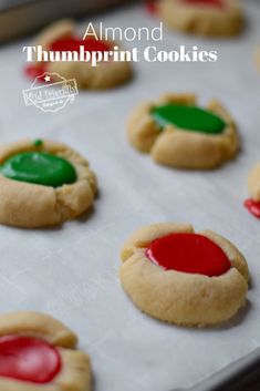 there are cookies that have been decorated with red and green icing