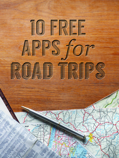 a wooden sign with the words 10 free apps for road trips on it and a map next to it