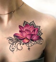 a woman with a pink flower tattoo on her chest