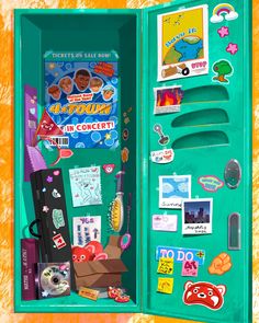 an open green box with pictures and stickers on the inside is filled with magnets