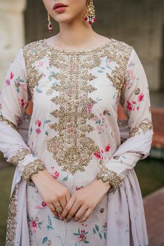 Shirt: Embroidered Printed Raw Silk Neckline: Embroidered Organza With adda Work (1 Pc)Front, Back & Chalk Lace: Embroidered Organza With Adda Work (5 M) Sleeves Lace: Embroidered Organza With Adda Work (0.85 M) Dupatta: Printed Chiffon (2.5 M)Dupatta lace: Embroidered Organza 4Sides(7.5 M) Trouser: Embroidered Printed Raw Silk Semi-stitched Gold Embroidered Fabric, Multicolor Floral Embroidered Top For Wedding, Unstitched Embroidered Multicolor Sharara, Unstitched Gold Embroidered Fabric, Bollywood Style Long Sleeve Embroidered Dress With Floral Embroidery, Long Sleeve Bollywood Style Embroidered Dress, Bollywood Style Long Sleeve Floral Embroidered Dress, Long Sleeve Semi-stitched Embroidered Floral Dress, Long Sleeve Embroidered Dress With Floral Embroidery