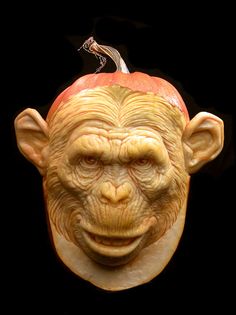 an apple with a monkey head on it